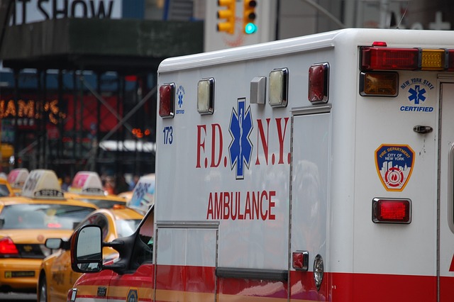 Ambulance going through city streets.